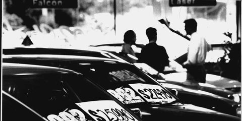 Locally made ford cars for sale at a city dealer, heavily discount should be a good year for local cars if price is kept down.Ford and Holden are counting on a bigger market share in 1993.The weak $A and gradual marketplace recovery of large six-cylinder